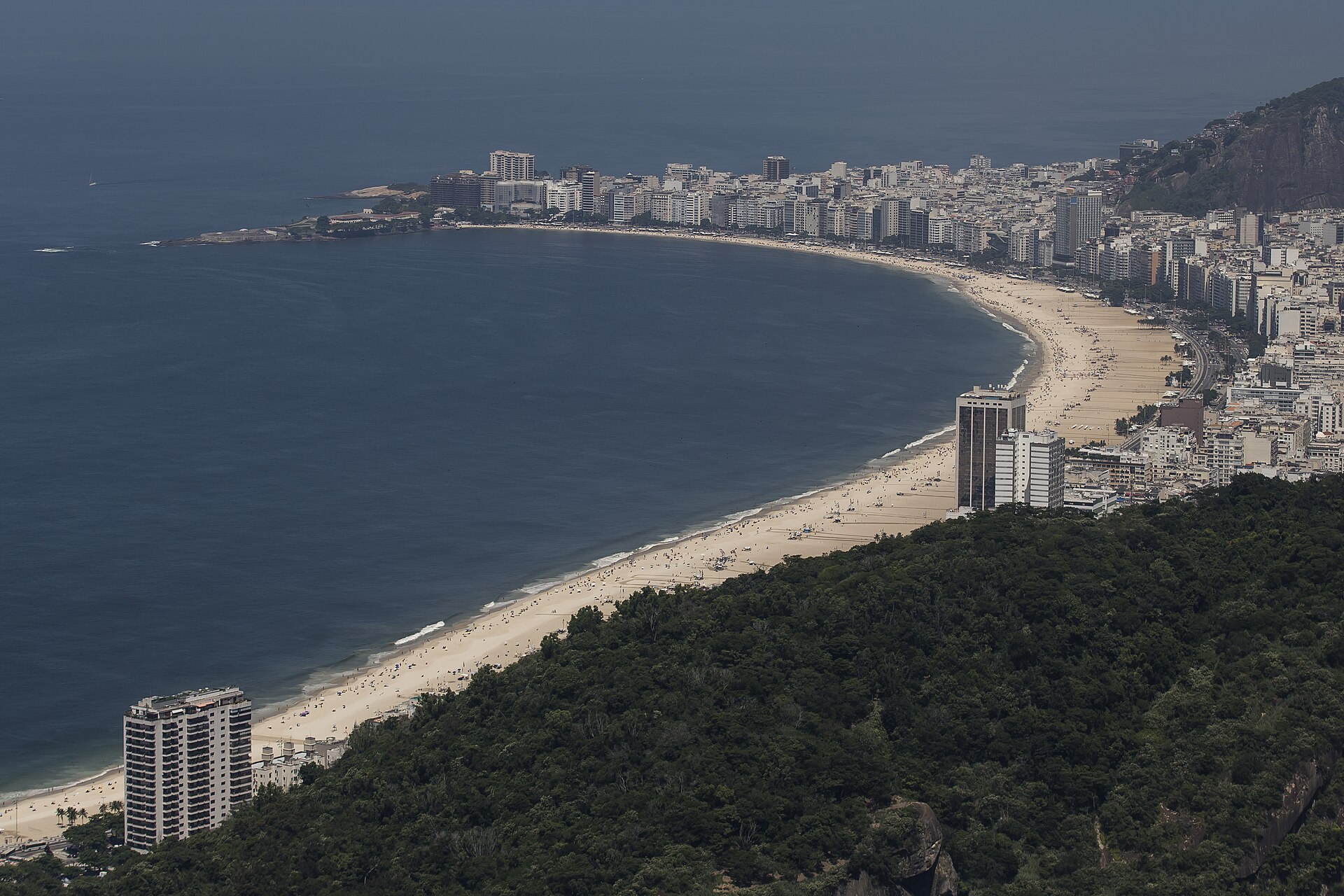 Aerial view of Copacabana beach and the surrounding Rio de Janeiro neighborhood at golden hour
